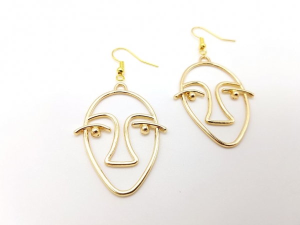 Gesichts Ohrringe goldfarben